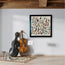 Handmade stone mosaic wall art with music notes pattern in dark frame
