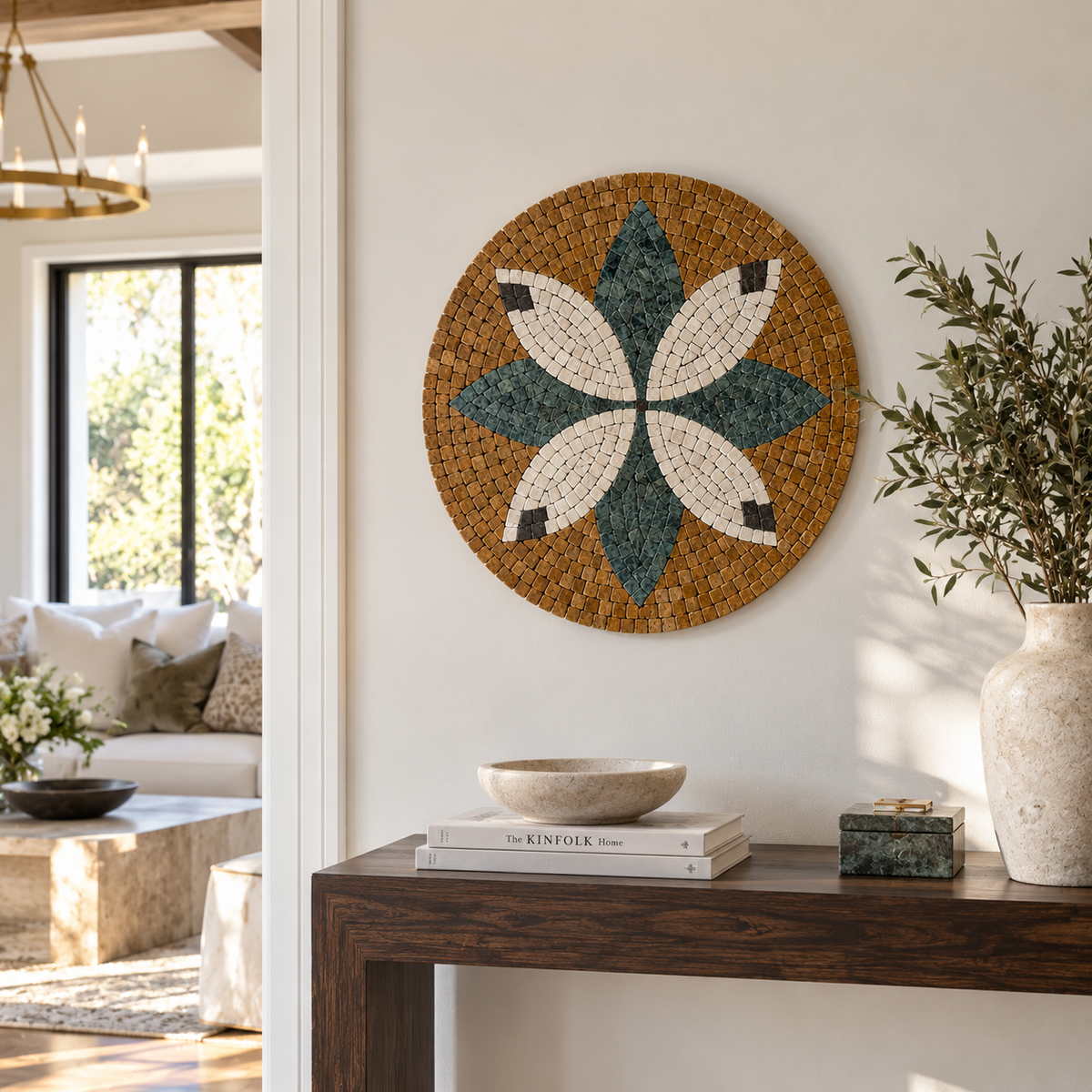 Round handmade mosaic floral wall art with teal and white flower on tan tile background