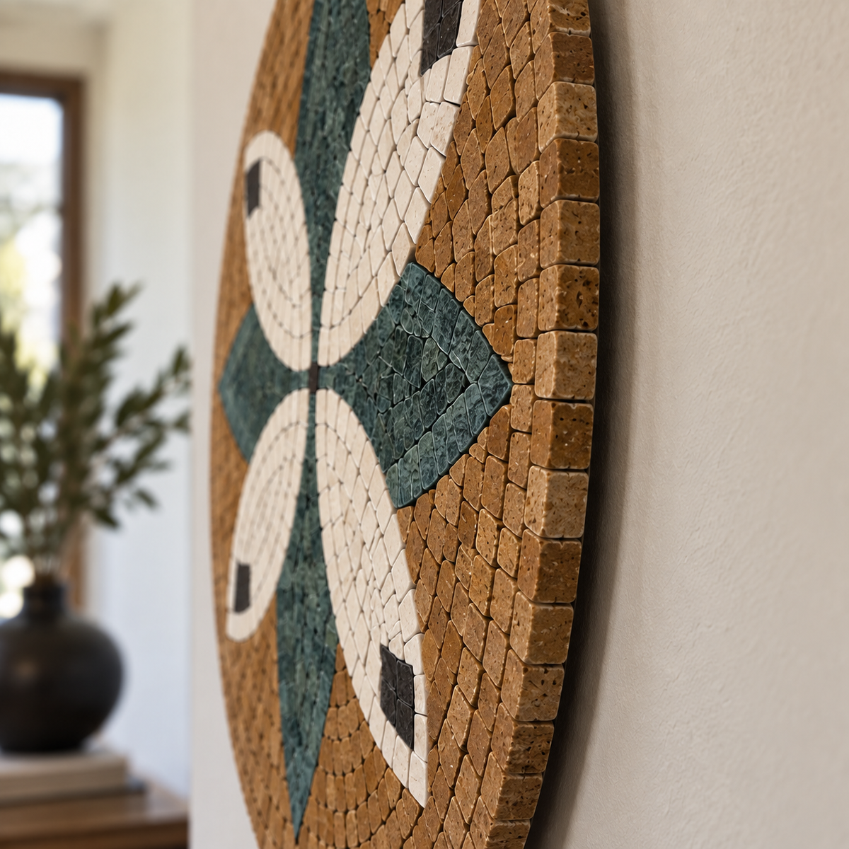Rounded mosaic floral wall art edge detail with teal and white petals on tan tiles
