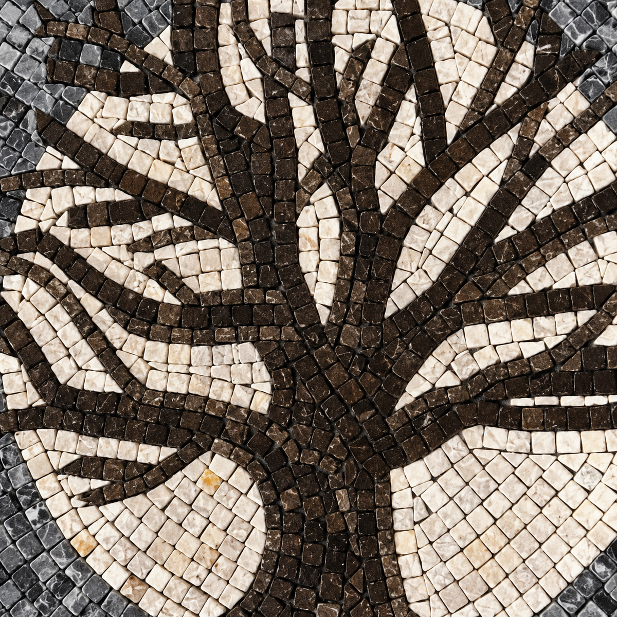 Stone mosaic tree branches close-up with black, white, and gray tile pattern.