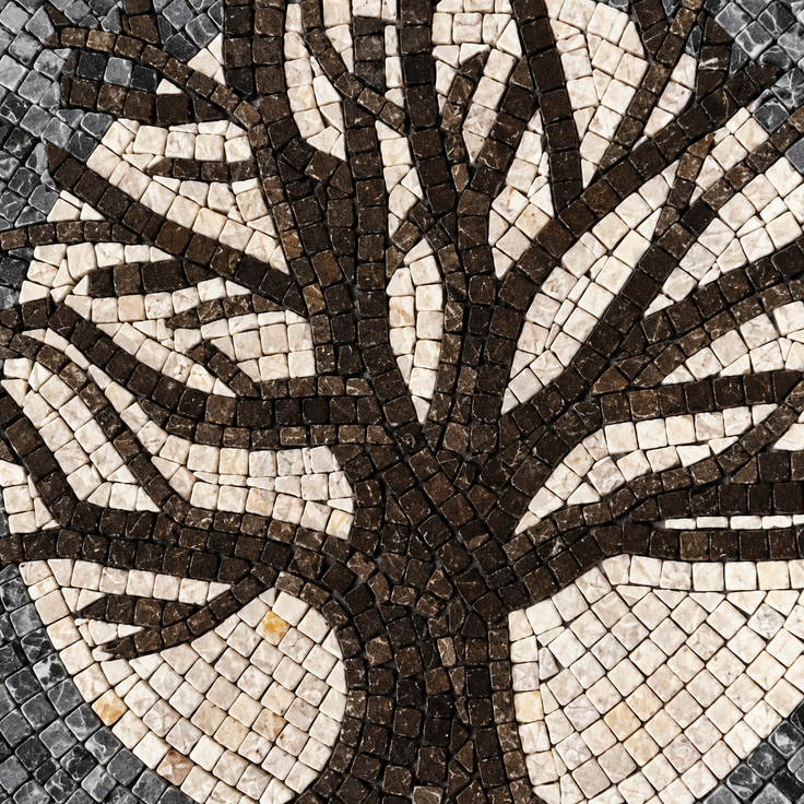 Stone mosaic tree branches close-up with black, white, and gray tile pattern.