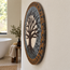 Oval stone mosaic wall art with central tree in gray tones and tan outer border.