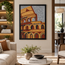 Framed mosaic wall art with stacked arches in gold, orange, red, and gray