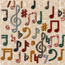 Close-up stone mosaic wall art of music notes in reds, blues, greens, and gold