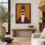 Framed mosaic wall panel featuring water bearer figure in yellow, black, and red tiles